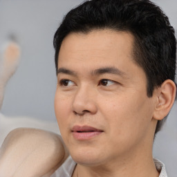 Neutral asian young-adult male with short  brown hair and brown eyes