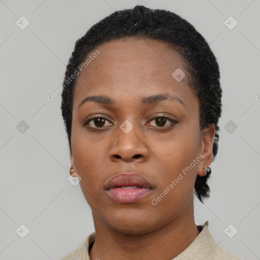 Neutral black young-adult female with short  black hair and brown eyes