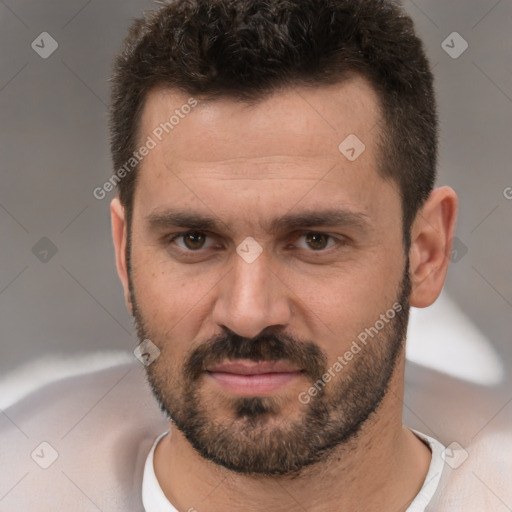 Joyful white young-adult male with short  brown hair and brown eyes