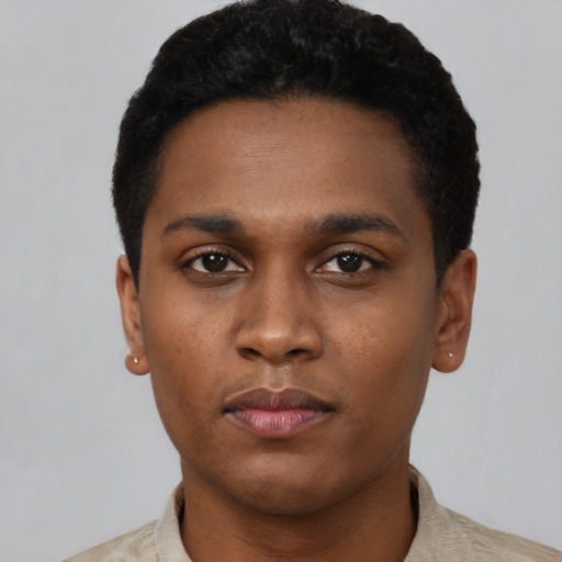 Neutral black young-adult male with short  black hair and brown eyes
