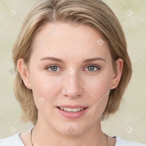 Joyful white young-adult female with medium  brown hair and blue eyes