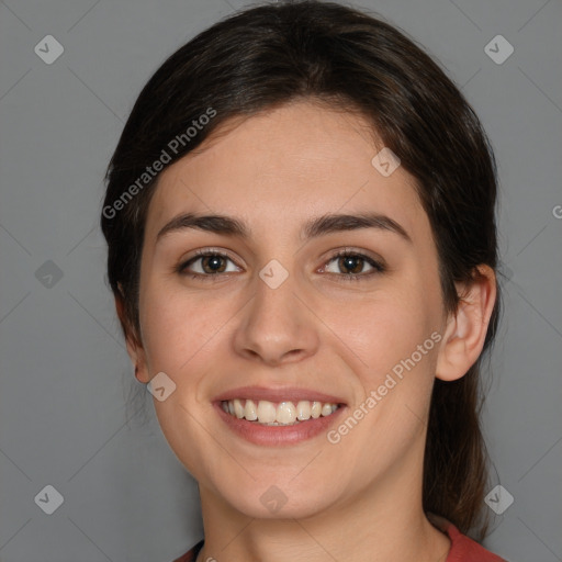 Joyful white young-adult female with medium  brown hair and brown eyes