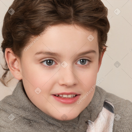 Joyful white child female with short  brown hair and blue eyes