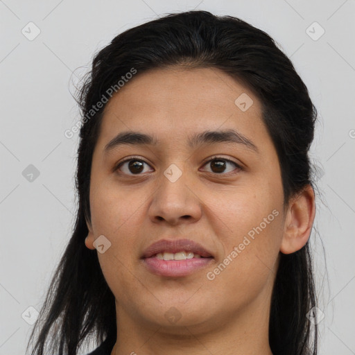 Joyful asian young-adult female with long  brown hair and brown eyes