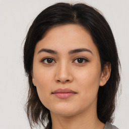 Neutral asian young-adult female with medium  brown hair and brown eyes