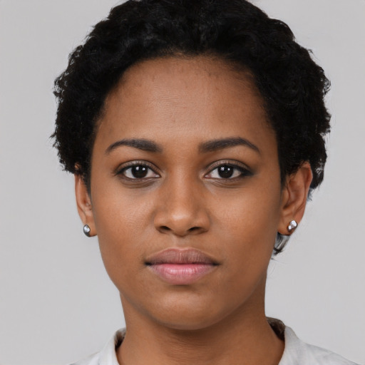Neutral black young-adult female with short  black hair and brown eyes