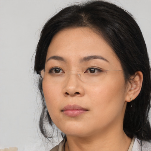 Neutral asian young-adult female with medium  black hair and brown eyes