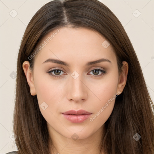 Neutral white young-adult female with long  brown hair and brown eyes