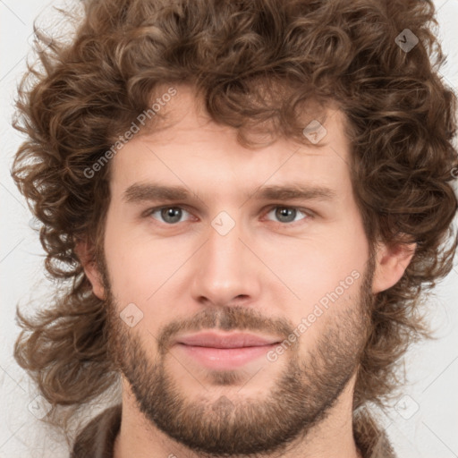 Joyful white young-adult male with medium  brown hair and brown eyes