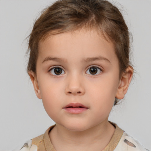 Neutral white child female with short  brown hair and brown eyes