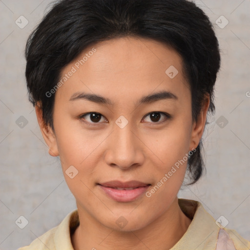 Joyful latino young-adult female with medium  brown hair and brown eyes