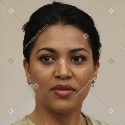 Joyful latino young-adult female with short  brown hair and brown eyes