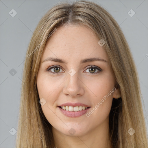 Joyful white young-adult female with long  brown hair and brown eyes