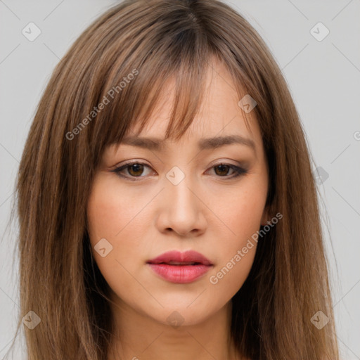 Neutral white young-adult female with long  brown hair and brown eyes