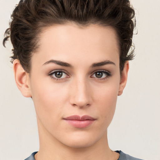 Neutral white young-adult female with short  brown hair and brown eyes