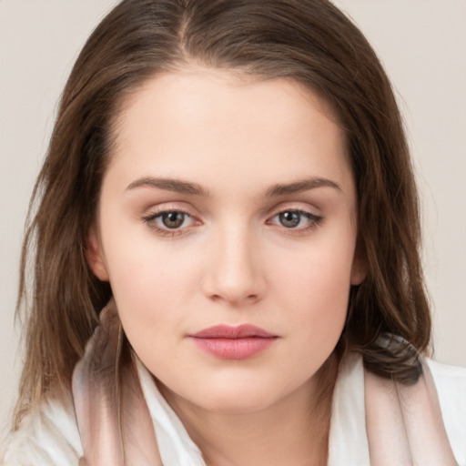 Neutral white young-adult female with medium  brown hair and brown eyes