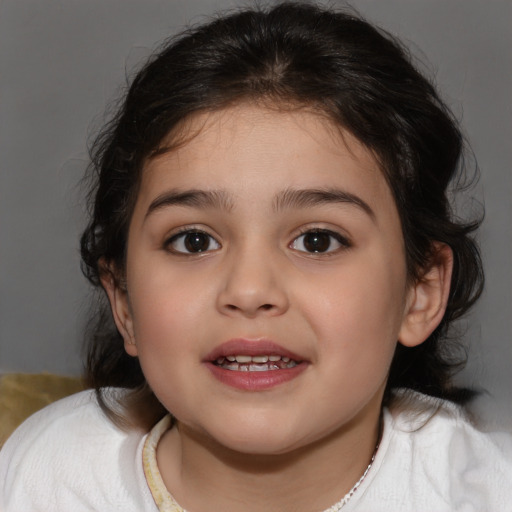 Joyful white child female with medium  brown hair and brown eyes