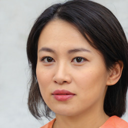 Neutral asian young-adult female with medium  brown hair and brown eyes