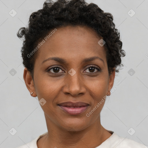 Joyful black young-adult female with short  brown hair and brown eyes