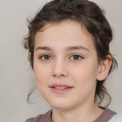 Joyful white child female with medium  brown hair and brown eyes