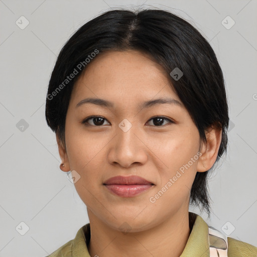 Joyful asian young-adult female with medium  black hair and brown eyes