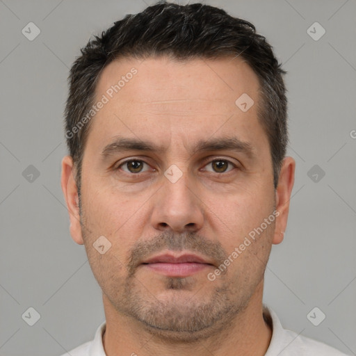 Neutral white adult male with short  brown hair and brown eyes