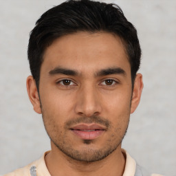 Neutral asian young-adult male with short  brown hair and brown eyes