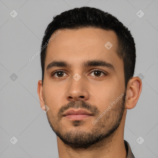 Neutral latino young-adult male with short  black hair and brown eyes