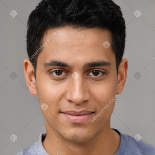 Joyful latino young-adult male with short  brown hair and brown eyes