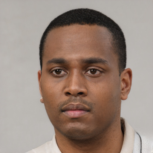 Neutral black young-adult male with short  black hair and brown eyes