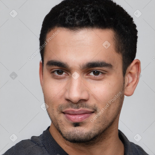 Joyful white young-adult male with short  black hair and brown eyes