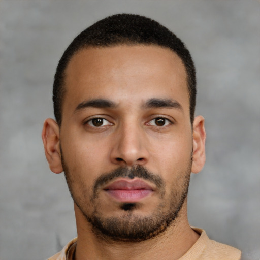 Neutral latino young-adult male with short  brown hair and brown eyes
