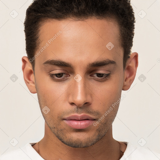 Neutral white young-adult male with short  brown hair and brown eyes