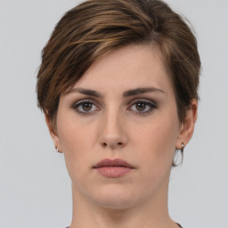 Neutral white young-adult female with short  brown hair and brown eyes