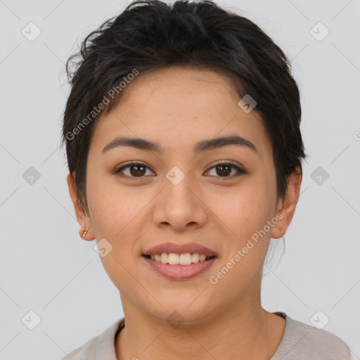 Joyful asian young-adult female with short  brown hair and brown eyes