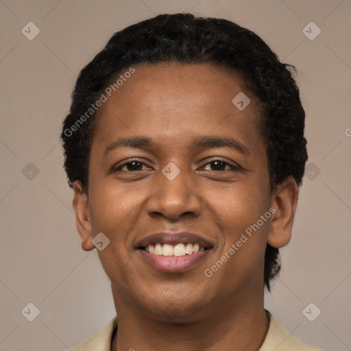 Joyful black young-adult female with short  black hair and brown eyes