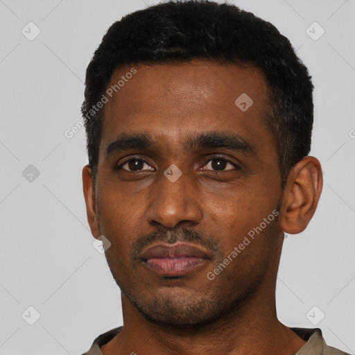 Neutral black young-adult male with short  black hair and brown eyes