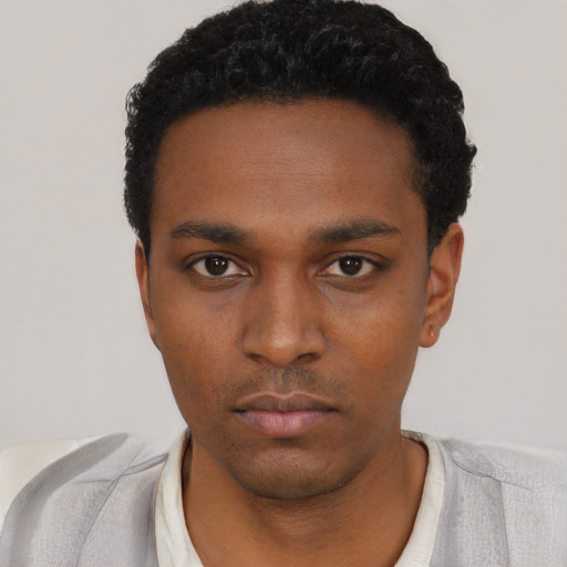 Neutral black young-adult male with short  black hair and brown eyes