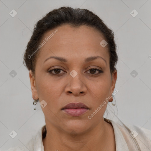 Joyful latino young-adult female with short  brown hair and brown eyes