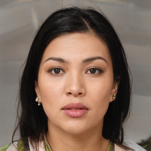 Neutral asian young-adult female with medium  brown hair and brown eyes