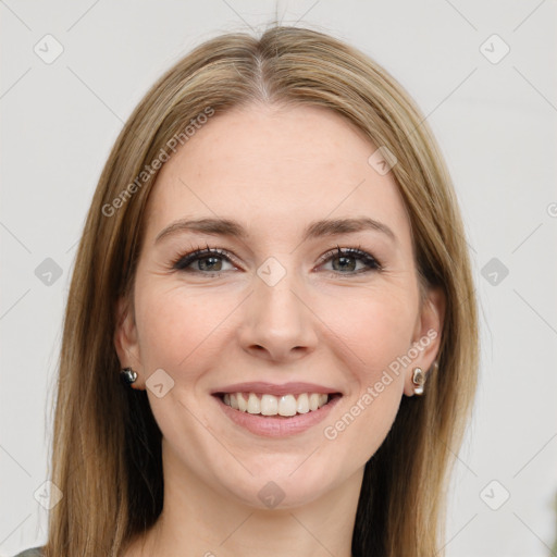 Joyful white young-adult female with long  brown hair and grey eyes