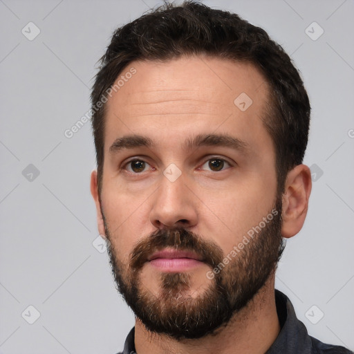 Neutral white young-adult male with short  black hair and brown eyes