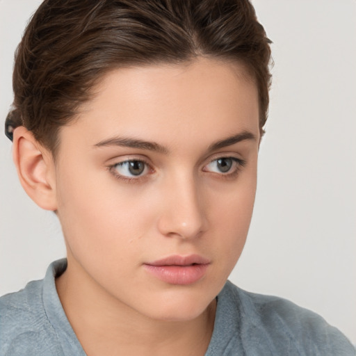 Neutral white young-adult female with short  brown hair and brown eyes