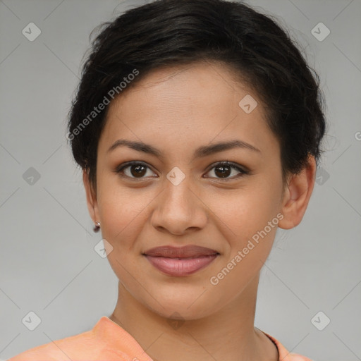 Joyful latino young-adult female with short  brown hair and brown eyes