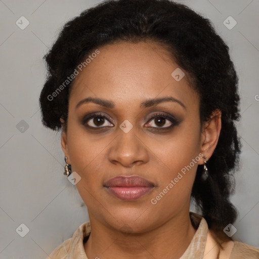 Joyful latino adult female with medium  brown hair and brown eyes