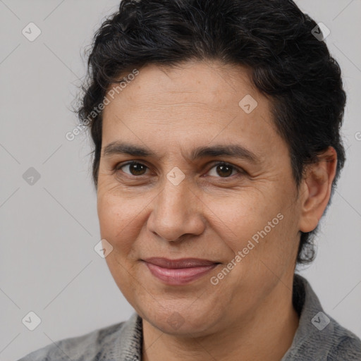 Joyful white adult male with medium  brown hair and brown eyes