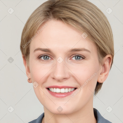 Joyful white young-adult female with short  brown hair and grey eyes