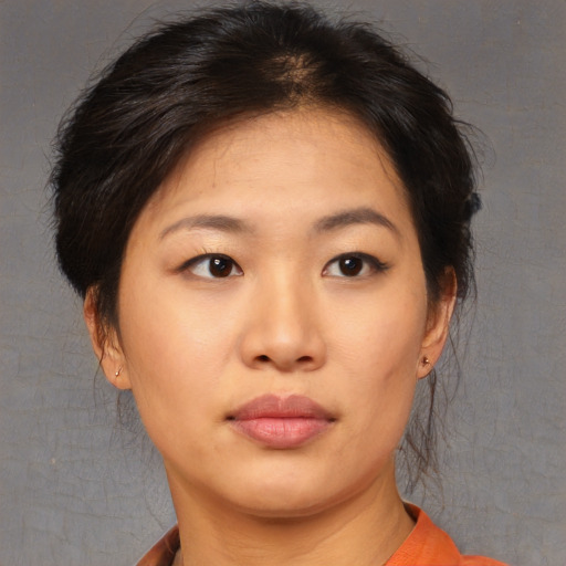 Neutral asian young-adult female with short  brown hair and brown eyes