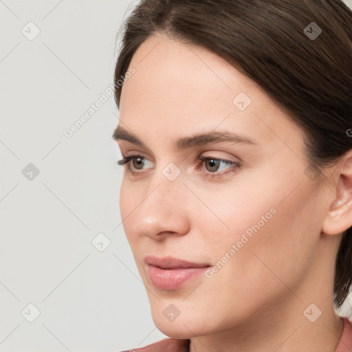 Neutral white young-adult female with medium  brown hair and brown eyes