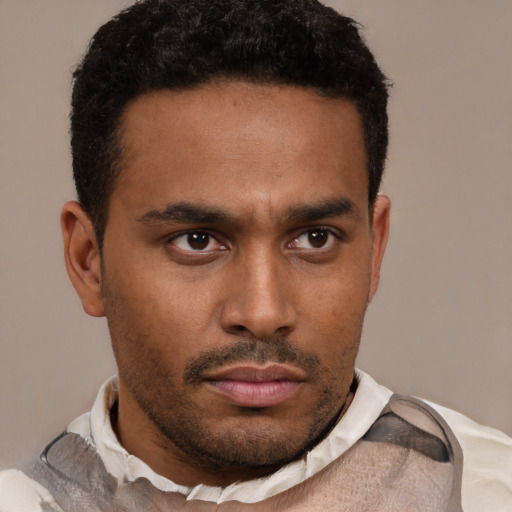 Neutral latino young-adult male with short  brown hair and brown eyes